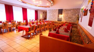 Börner-King GmbH Essensbereich des Restaurants Bei Christian aus einer anderen Perspektive