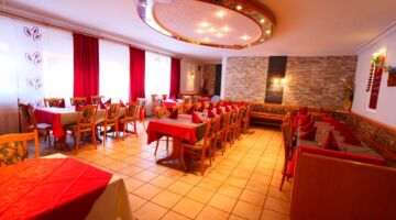 Börner-King GmbH Essensbereich des Restaurants Bei Christian aus einem anderen Blickwinkel